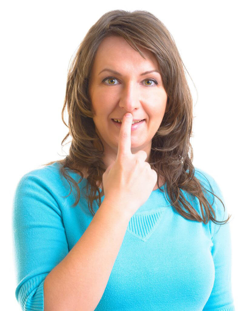Woman Demonstrating EFT Tapping